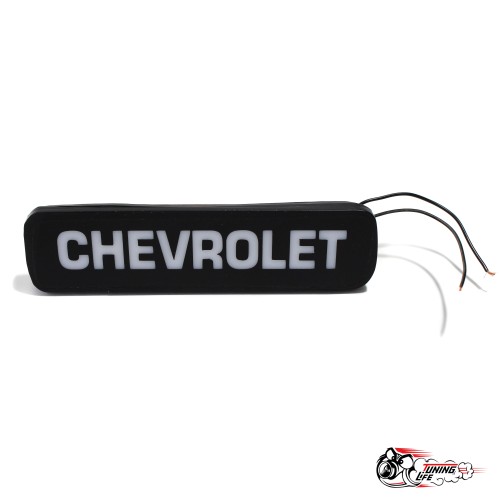 Заглушка в задний бампер с надписью " Chevrolet" на Шевроле НИВА